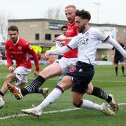 Josh Sheehan in action for Wanderers against Morecambe on Saturday
