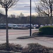 Travellers spotted setting up camp on car park