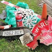 Litter, including the front end of a car, was found by Horwich First Community Litter Pickers