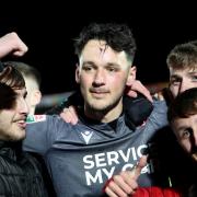 James Trafford celebrates with Wanderers fans after the semi-final win against Accrington.