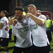Elias Kachunga and Dion Charles celebrate the win against Accrington Stanley