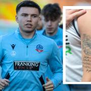 Aaron Morley shows where the Wembley winner tattoo will go.... If Wanderers are successful!