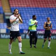 Bolton Wanderers' MJ Williams applauds fans at final whislte