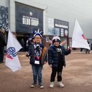 Two Bolton Wanderers fans show their support