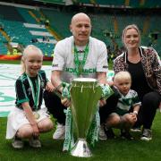 Celtic's Aaron Mooy and family pose with the trophy after the cinch Premiership match at Celtic Park, Glasgow.