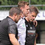 George Johnston is helped from the pitch after injuring his knee in a pre-season friendly against Bamber Bridge