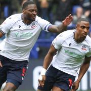 Ricardo Santos celebrates with Victor Adeboyejo after his headed goal from a corner against Lincoln