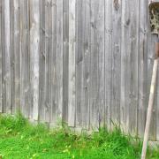 What can I do if my neighbour is leaning things on my fence?