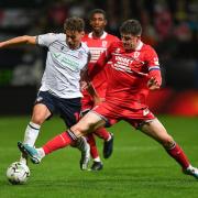 Bolton Wanderers' Dion Charles battles with Middlesbrough's Darragh Lenihan