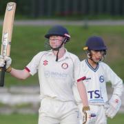 Tonge batsman Ed Lynch acknowledges his 50 runs. The 15-year-old made 55 not out against Lostock. Picture by Harry McGuire