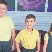 Bradley, year 4, Kyle, year 3 and Chloe, year 1, at St Gregory’s Farnworth in 2018