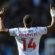 Victor Adebiyejo points to the skies after scoring his fifth goal of the season