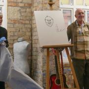 Kate Green and Steve Fisher unveiling a very special portrait