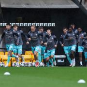 Bolton Wanderers players come out for the warm up at Port Vale