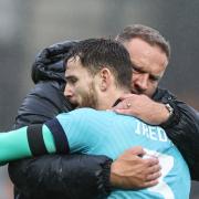 Ian Evatt hugs Jack Iredale at the end of the game against Port Vale in September