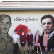 Pupils at Sacred Heart with the mural wall