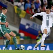 Eoin Toal goes for the ball against Slovenia's Benjamin Sesko in the Euro qualifier against Slovenia
