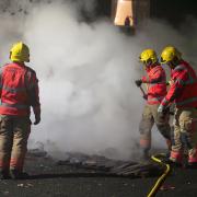 Firefighters tackling the fire in Little Lever