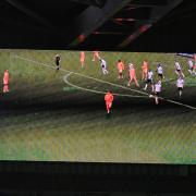 The final score is displayed on the big screen at Wanderers