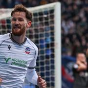 Jack Iredale celebrates scoring Bolton's first goal in a seven-goal drubbing of Exeter City