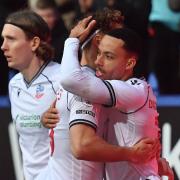 Josh Dacres-Cogley celebrates his goal against Leyton Orient with Dion Charles and Jon Dadi Bodvarsson