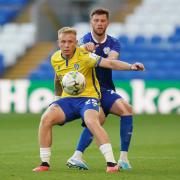 Joe Taylor is action for Colchester United against Cardiff City earlier this season