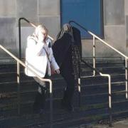 Tracy Swinbourne (in the light coloured coat) leaving Bolton Crown Court