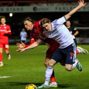Jon Dadi Bodvarsson battles for the ball in the midweek win against Accrington