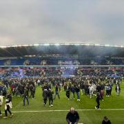 Reading fans invade the pitch