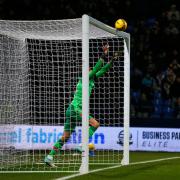 Tim Krul pushes Victor Adeboyejo's lobbed shot from under his crossbar in the FA Cup third round replay against Luton Town