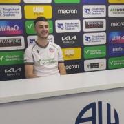 Aaron Collins speaks to the local press after signing for Wanderers