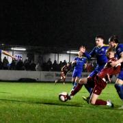 Nathan Caine scores Atherton Collieries’ second goal at Radcliffe. Picture by Rob Clarke