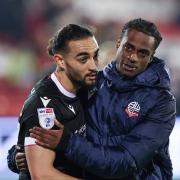 Randell Williams, left, with Nat Ogbeta as they leave the pitch at Oakwell
