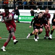 Colls’ Enock Lusiama scores from the spot at Morpeth on Saturday
