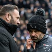 Ian Evatt and Paul Warne share a word before the game at Derby County