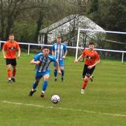 Daisy's Henry Chalkley goes on the attack against Atherton LR