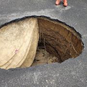 Sink hole on the ball court