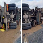 The overturned road sweeper