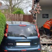 UPDATES: Emergency services called after car crashes into house