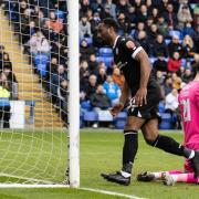 Cameron Jerome scores Bolton's third goal of the day at Peterborough United