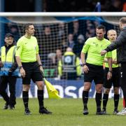 Ian Evatt speaks to the match officials at the end of Saturday's 3-3 draw at Peterborough United