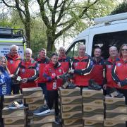 Bolton Mountain Rescue team and their donation for Grubs. Pictures Bolton Mountain Rescue Team