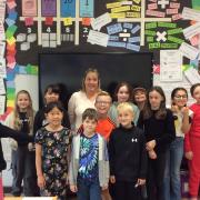 Blackrod Primary School pupils explore history of their school. They are pictured with Suzanne Hartop