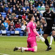 Cameron Jerome scores Bolton's equalising goal against Peterborough on the last day of the season
