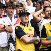 Bolton Wanderers fans show their frustration during the defeat to Oxford United