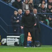 Bolton Wanderers manager Steven Schumacher shouts instructions to his team from the technical area