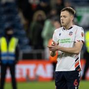 George Johnston is back in the fold for Wanderers' trip to Mansfield Town