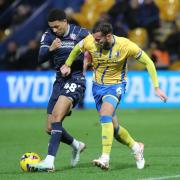 Mason Burstow battles for possession