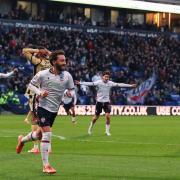 Bolton Wanderers' Josh Sheehan celebrates scoring the opening goal .