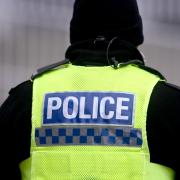 A boy was injured after a fight outside a row of shops in the Bradford district